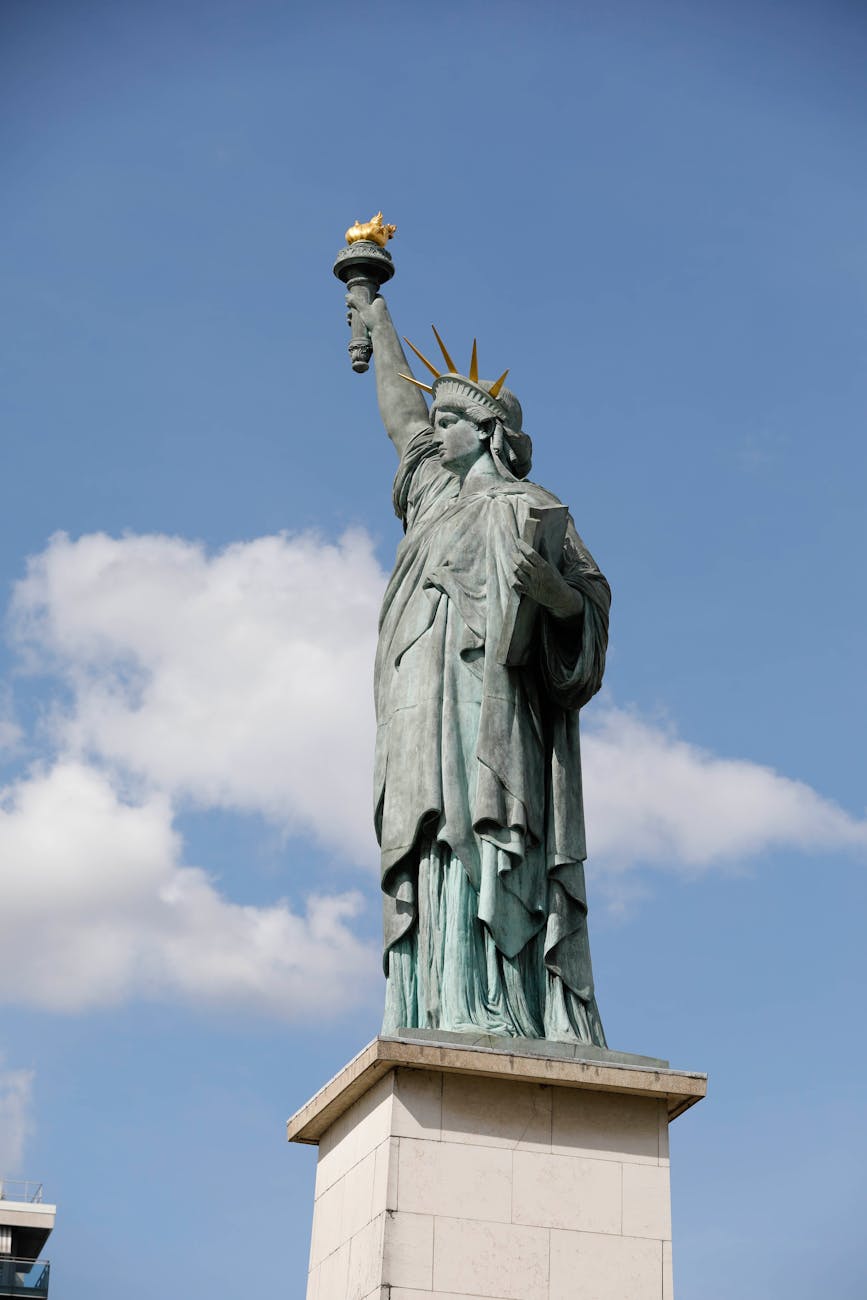The Statue of Liberty captured on a clear day, symbolizing freedom and democracy.
